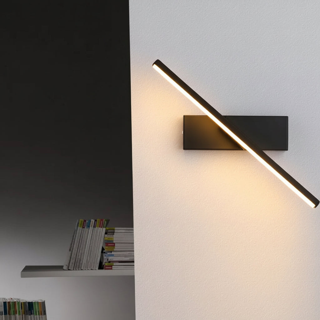 Primeiro plano detalhado da Arandela Rotativa Sereno de alumínio LED cor preta, com luz quente, estrutura em alumínio resistente e design minimalista contemporâneo